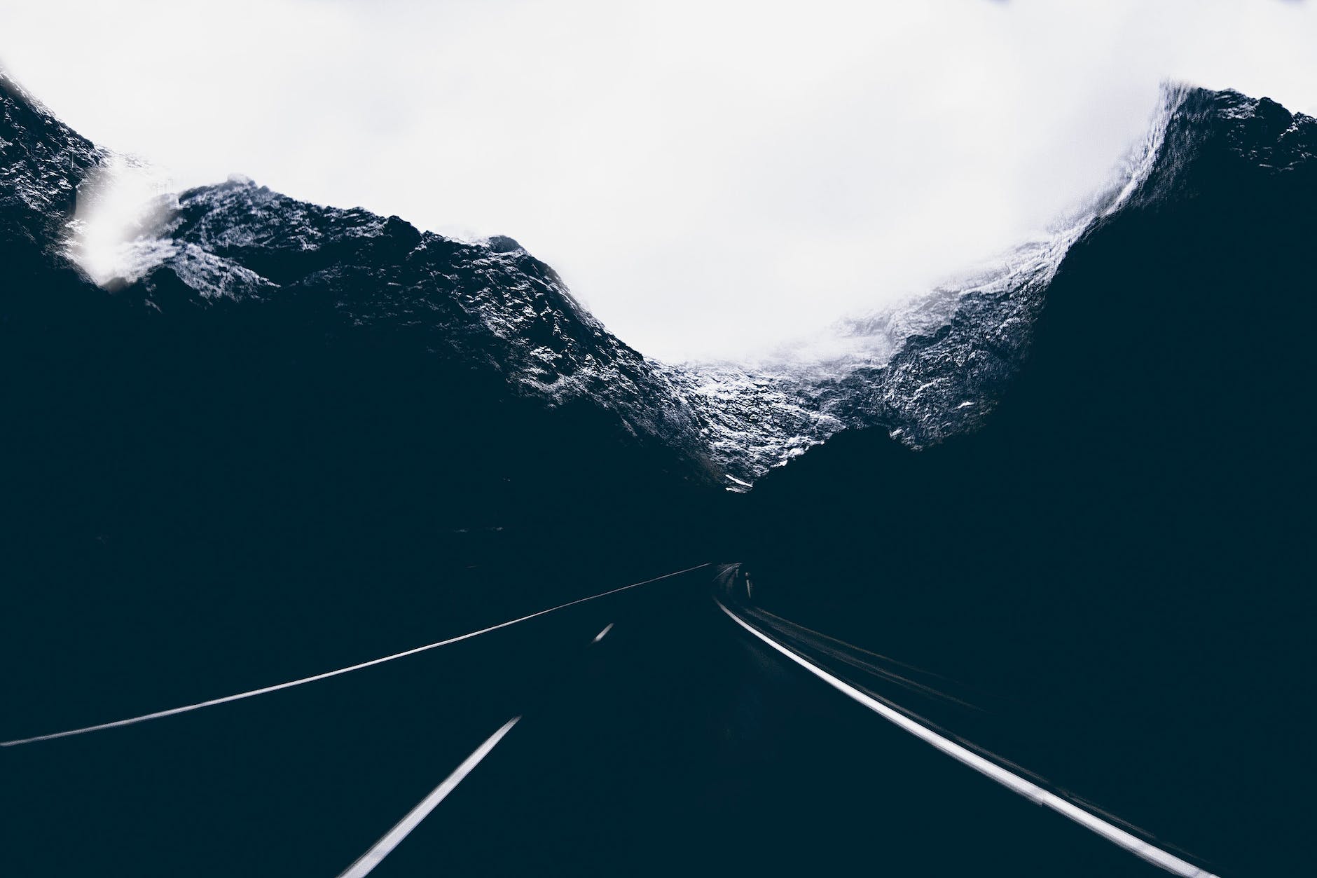 landscape photo of road in the middle of mountains